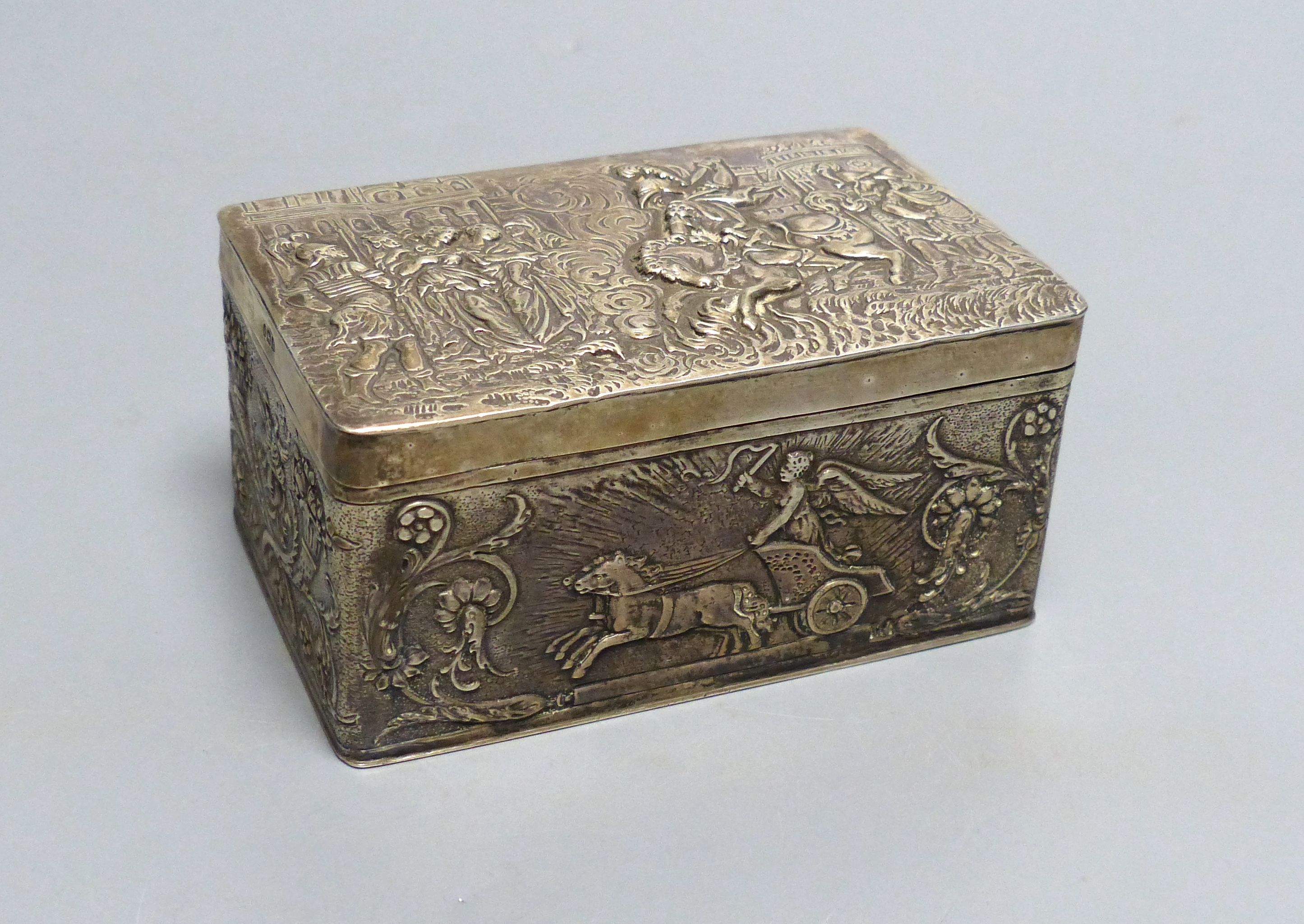 An early 20th century Hanau embossed silver rectangular box with hinged cover, import marks for London, 1902, width 10.7cm,